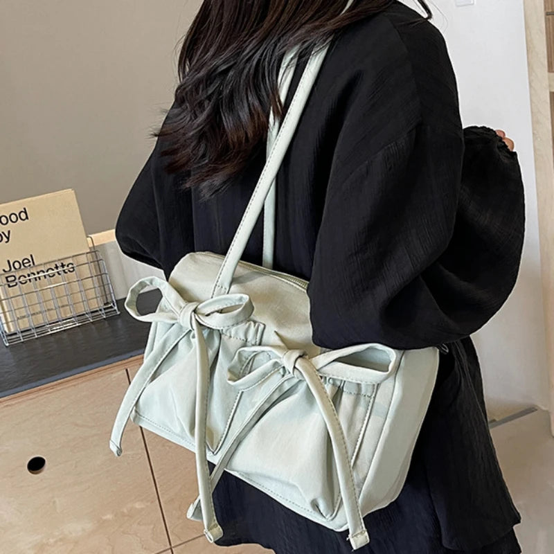 2024 New Korean Bow Nylon Shoulder Bag Fashionable and Sweet Design Tote Bag Folded Large Capacity Commuter Women's Handbag